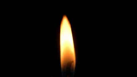 Candle flame isolated on black background. Stock Footage 330124987