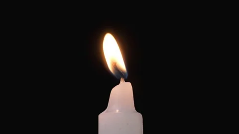 Candle flame lights and is blown out. Central framing. Stock Footage 170078574