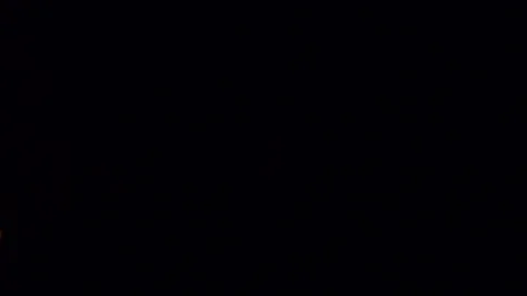 Candle flame at night Stock Footage 104086602