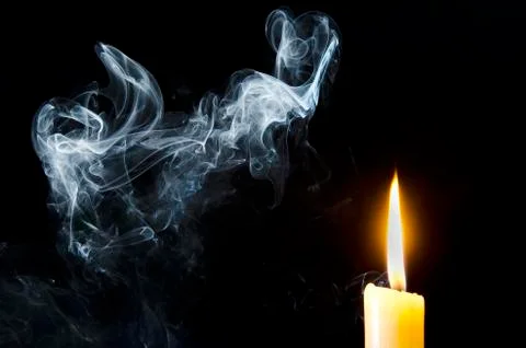 Candle, flame, smoke. Stock Photos