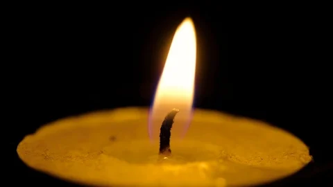 Candle flame soft glow motion on black blur background,inspiration mood concept Stock Footage 119486187