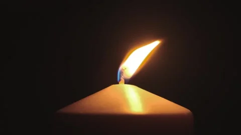 Candle flame sways in wind on dark background Stock-Footage 308732201