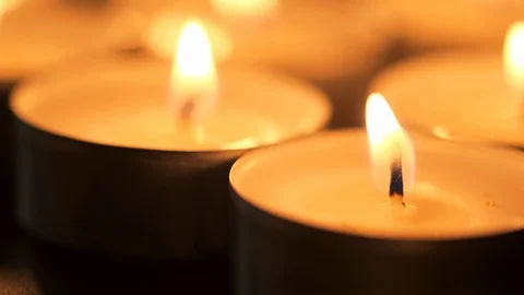 The candle flame sways in the wind Stock Footage 115457557