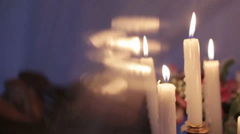 The candle flame through the glass Stock Footage 59782404