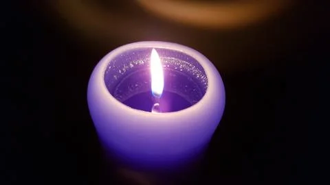 Candle flame twinkle in darkness Stock-Fotos