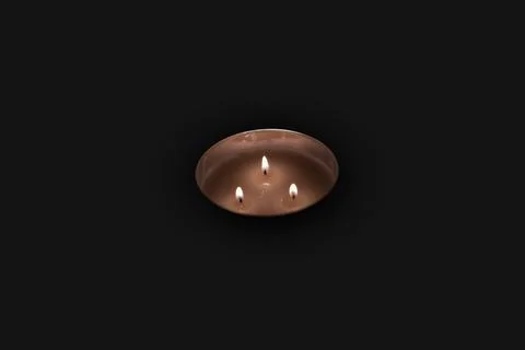 Candle flames on a black background 写真素材