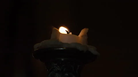 Candle flickering and then going out Stock Footage 63057157