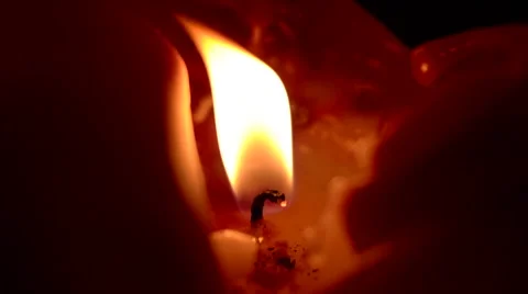 Candle flickering flame slow motion Stock Footage 49974939