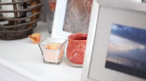 Candle flickers in the breeze side angle 2 Stock Footage 64221485