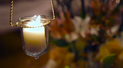 Candle To Flowers Rack Focus Stock Footage 53584361