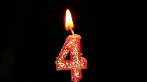 Candle in the form of four Stock Footage 49063634