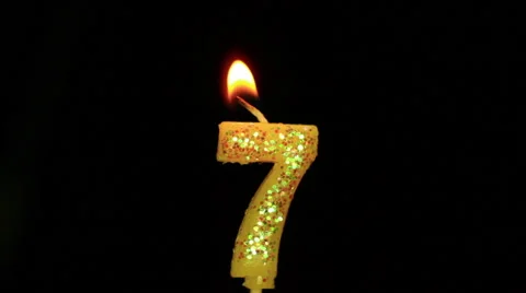 Candle in the form of seven Stock Footage 49063663