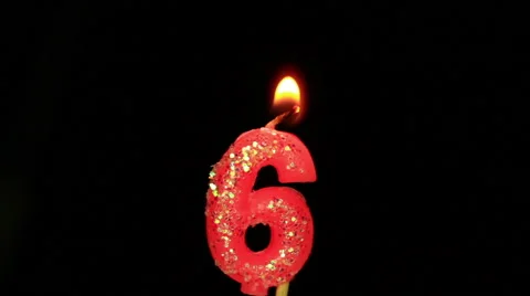 Candle in the form of six Stock Footage 49063658