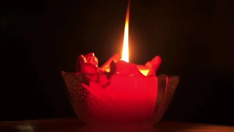 Candle in a glass Stock Footage 102783623