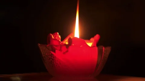 Candle in a glass Stock Footage 102783705
