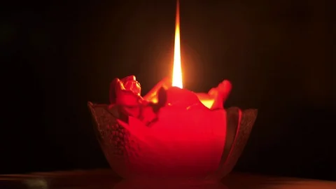 Candle in a glass Stock Footage 102783832