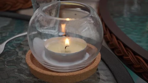 Candle in a glass Stock Footage 163566635