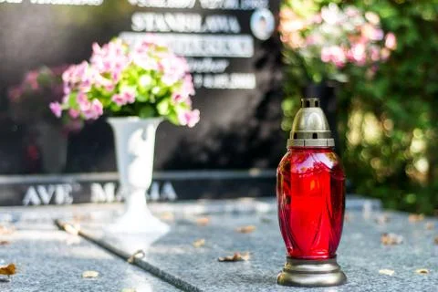 Candle on the grave Stock Photos