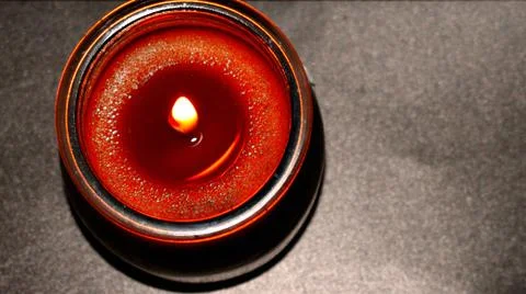 Candle on a gray background Stock Photos