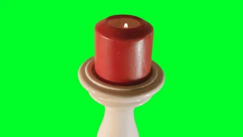 Candle on a green screen Stock Footage 75879361