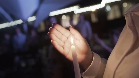 Candle in hand in the evening Stock-Footage 81826821