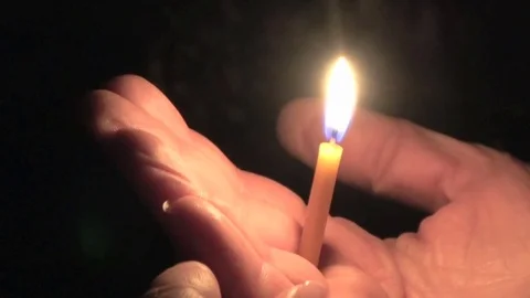 Candle in the hand Stock Footage 81676549