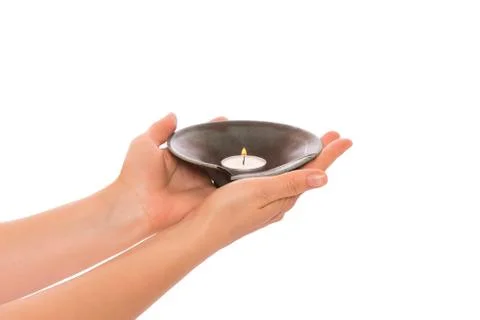 Candle in the hands Stock Photos