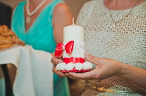Candle in hands  Stock Photos