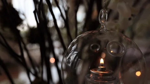 Candle hanging in glass bubble medium Stock Footage 103546386