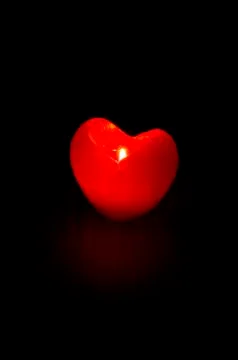 Candle - heart. Stock Photos