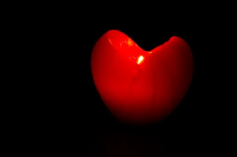 Candle - heart. Stock Photos