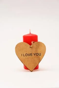 Candle with heart Stock Photos