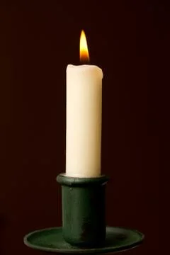 Candle in holder Stock Photos