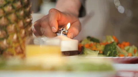 Candle on the holiday table Stock Footage 99790726