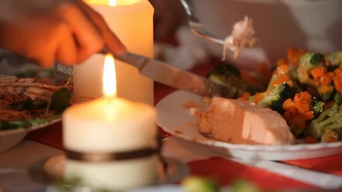 Candle on the holiday table Stock Footage 99793428