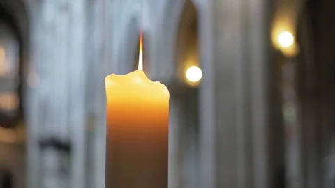 Candle in a holy church Stock Footage