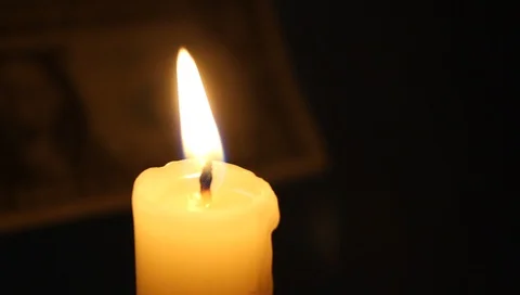 Candle illuminates the flame part of the dollar Vídeo Stock 88827435