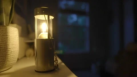 Candle inside during Hurricane Ian power outage, Florida, Heavy Wind sounds, 4K Stock Footage 218972942