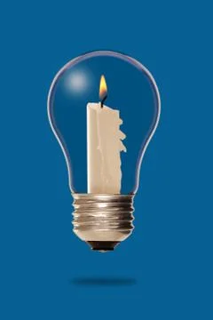 Candle inside a light bulb Stock Photos