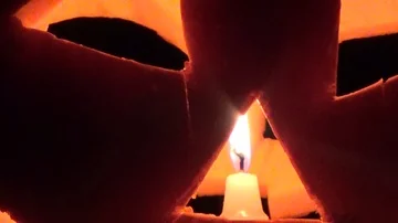 The candle inside the pumpkin Stock Footage 85843258