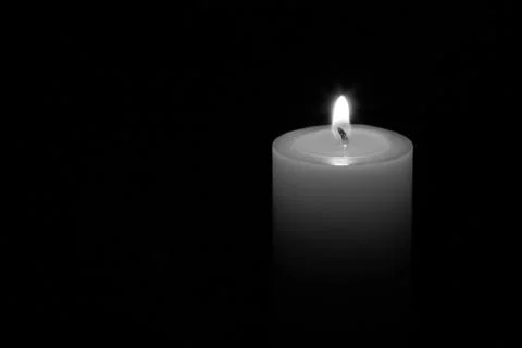 A candle isolated with black background 스톡 사진