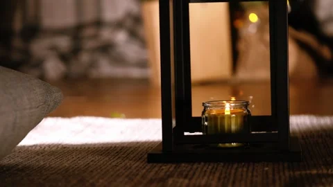 Candle in lantern with Christmas background Video stock 296597556