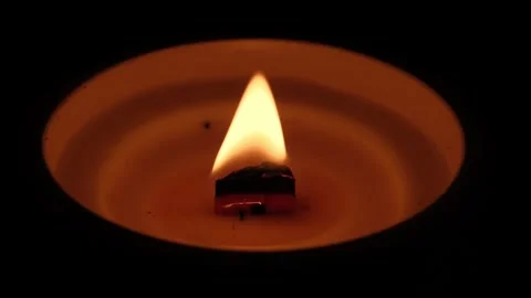 Candle light. Burning candle on dark background. Stock Footage 308180237