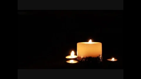 Candle light burning Stock Footage 79734301