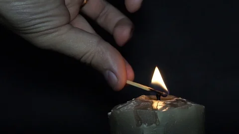 Candle light close up. Candle burning with bokeh lights on the background Stock Footage 99385246