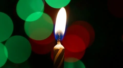 Candle light with colored bokeh Stock Footage 8962798
