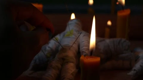 Candle light in the dark and curse doll Stock Footage 194964929