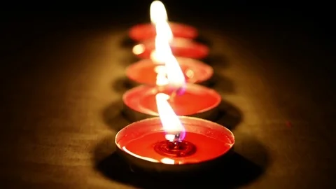 Candle light in dark background Видео 84212643