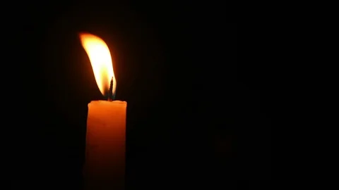 Candle light on dark background Stock Footage 128229715
