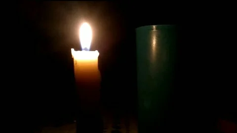 Candle light in the dark Stock Footage 245344274